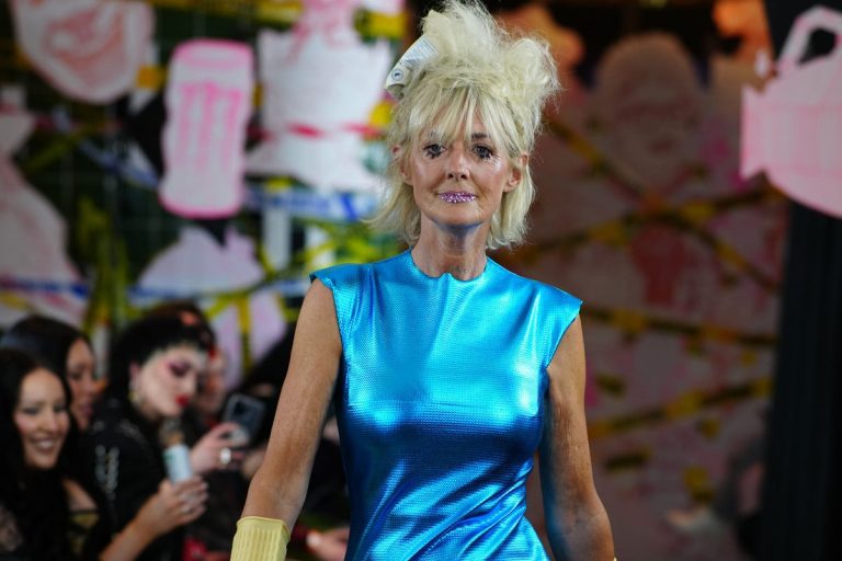 Unfastened Girls’s Jane Moore steps out in electrical blue costume at London Trend Week