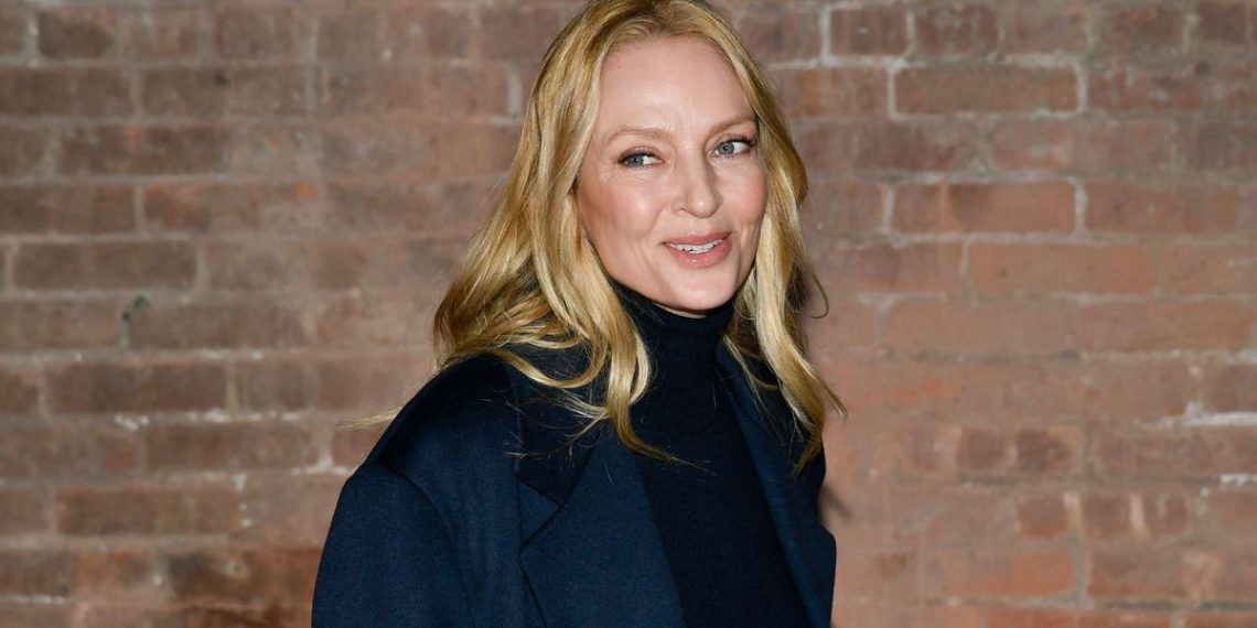 Trying to combine up your color mixtures? Uma Thurman’s coat and smooth trousers make a case for navy and brown