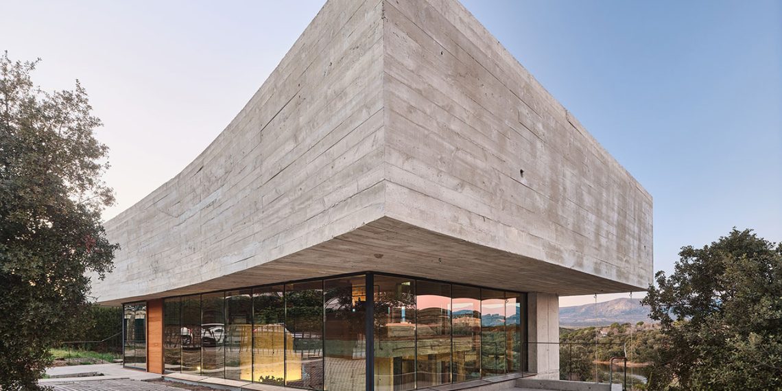 Oak Home is a concrete and glass home with floating ranges