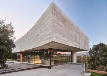 Oak Home is a concrete and glass home with floating ranges