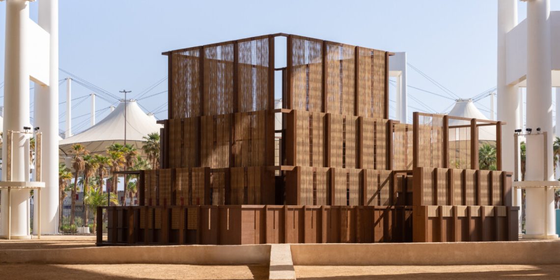 Nicolas Fayad on the tissue of palm waste within the prayer area on the Islamic Arts Biennial