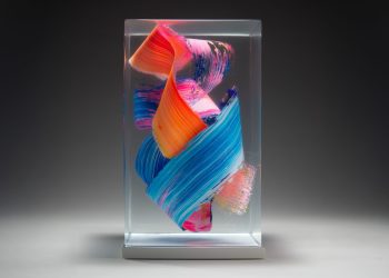The colourful brushes float in resin cubes in Fabian Oefner’s sculptural room at portray – Colossal