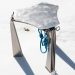 The “hanging” chair of metal with carabinie attracts the design from mountaineering