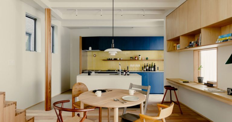 Wall shapes rotated triangular gaps in Tokyo wood home
