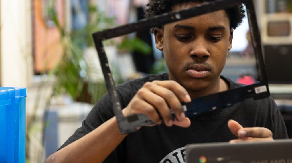 Oakland college students restore college laptops in Arms-on-Tech program