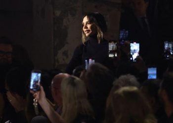 Victoria Beckham reveals curled hems and collars at Paris Vogue Week