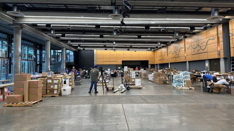 Volunteers put together to serve 1000’s for public well being clinic at Seattle Heart