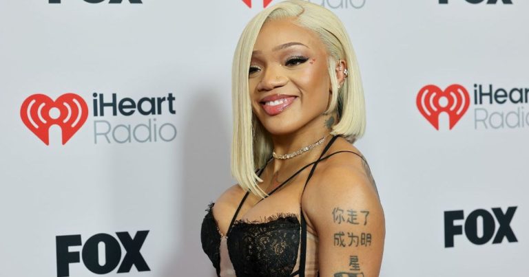 GloRilla’s Shimmery Costume in iHeartRadio Pictures Is All About Strings