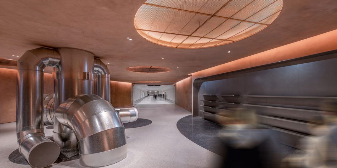 Metal pipes are operating by way of the linear inside of Brewery after AIM in Shenzhen