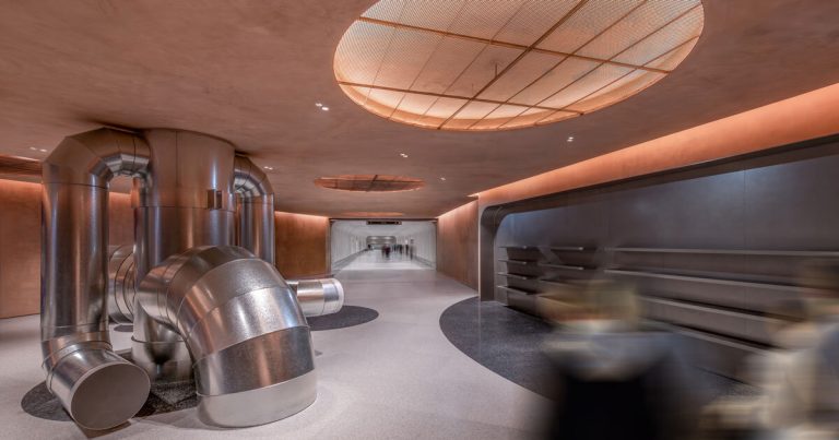 Metal pipes are operating by way of the linear inside of Brewery after AIM in Shenzhen
