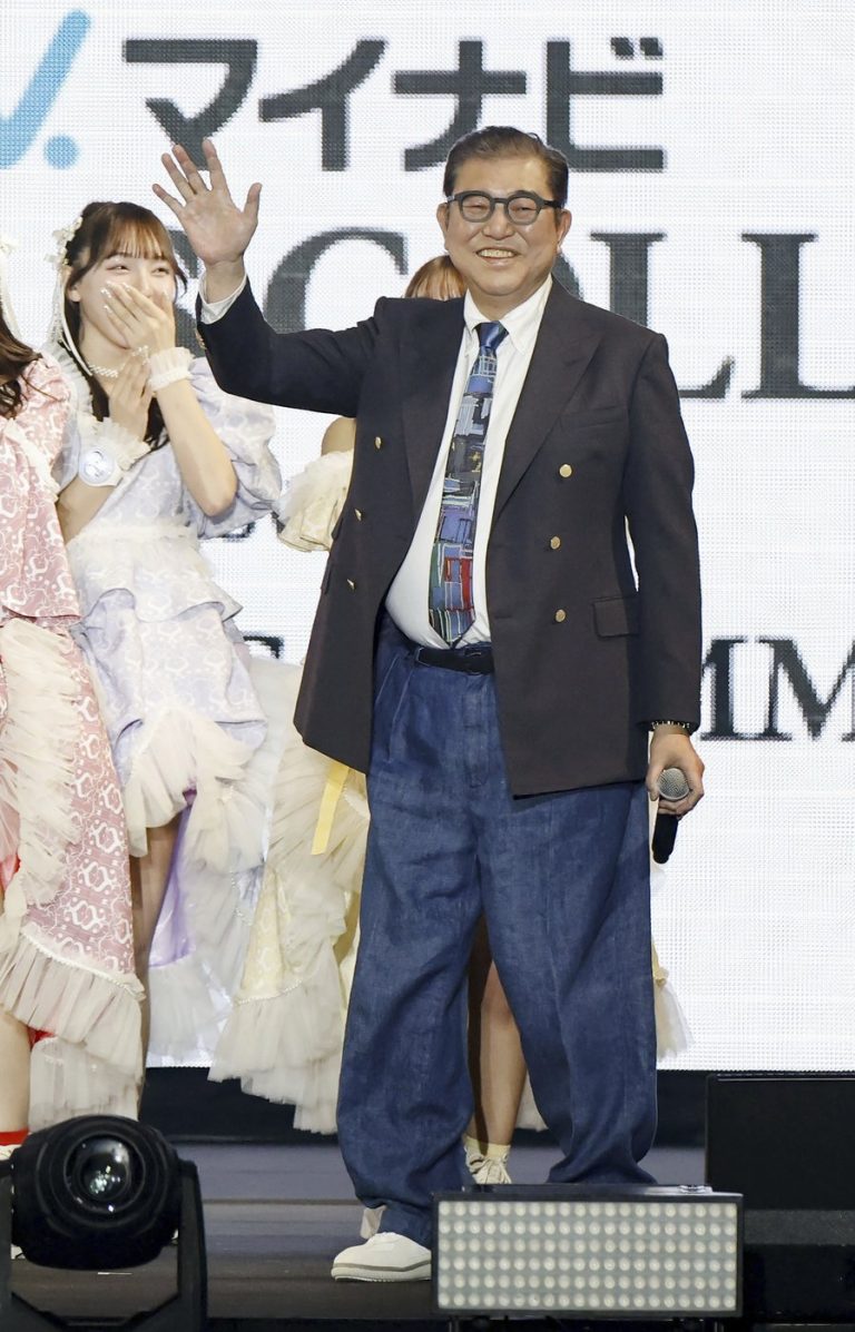 Japan’s PM admits to being ‘extraordinarily nervous’ as he swaps performance for type at style present