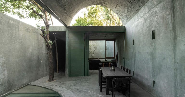 Inexperienced pigmented concrete facades carve the home Gruta in Yucatán, Mexico