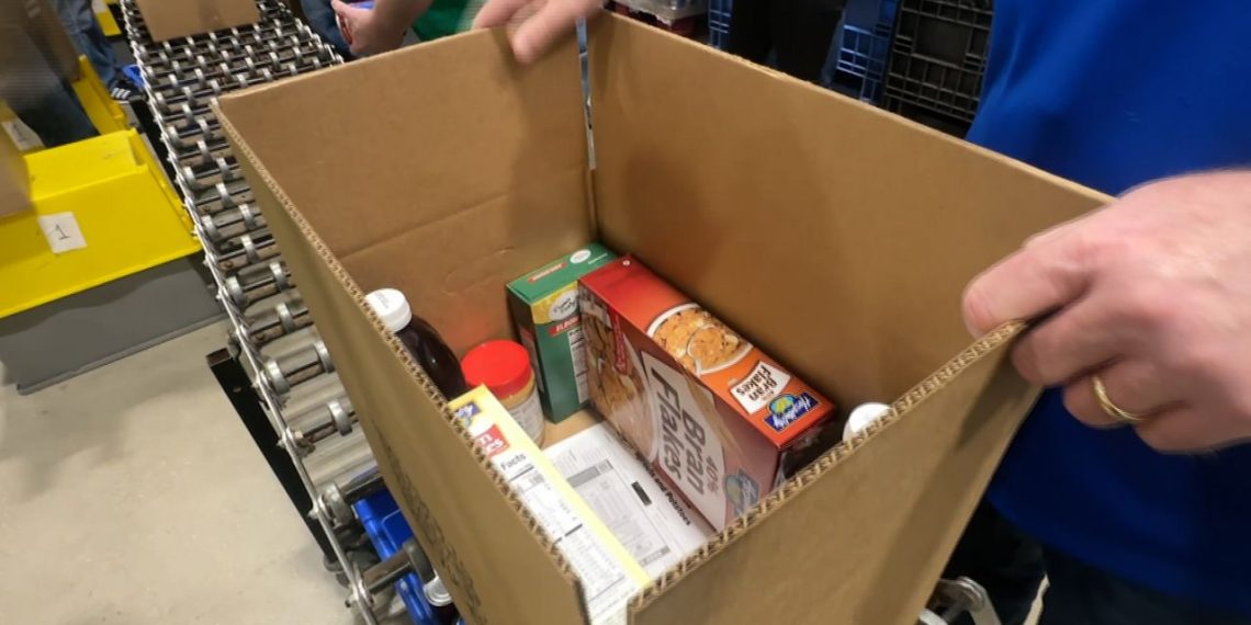 Volunteers work to assist after meals financial institution loses funding 