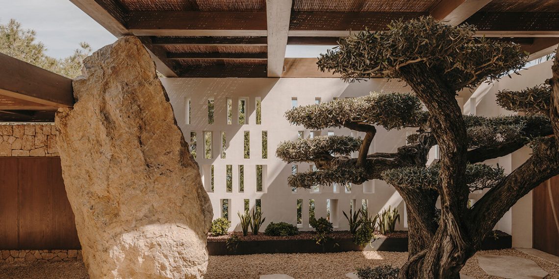 Ok-Studio turns conventional Ibizan finca with flowing areas and sculptural particulars