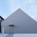 The residence of Metallic Mass Foils of Architects, reflecting the altering sky in Japan