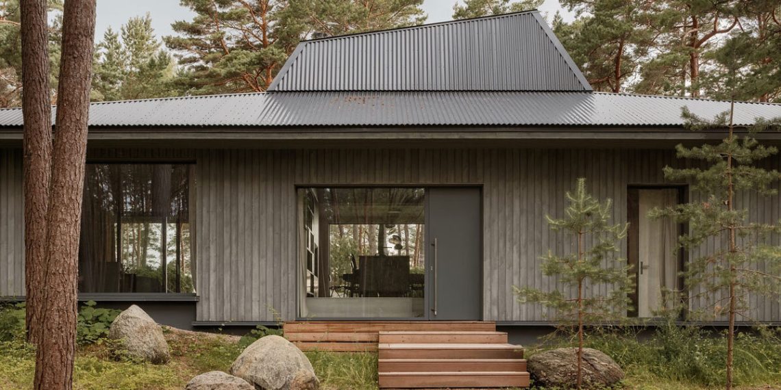 Inclined roof sculpts geometric mild over Uzv at residence by open advert