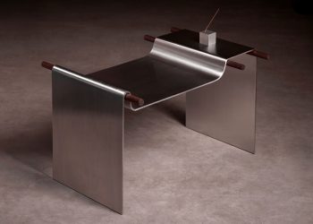The parchment chair in a sheet of metal curtains like the material