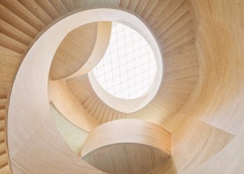Spiraling timber atrium de icd connects the flooring to Blmer Lehmann HQ in Switzerland