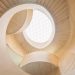 Spiraling timber atrium de icd connects the flooring to Blmer Lehmann HQ in Switzerland