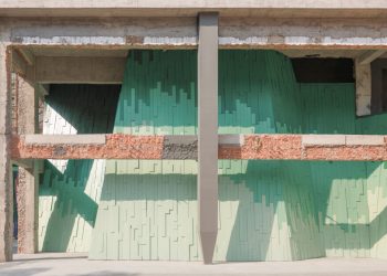 The Wutopia Inexperienced Stratified Facade, harking back to Chinese language portray, transforms the manufacturing facility into theater