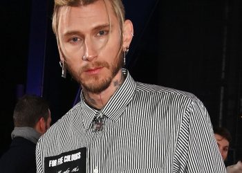 MGK Shares “Dad” Photographs After Child With Megan Fox