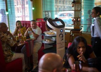 A Havana restaurant defies the technological struggles in Cuba with digital menus and a robotic waitress
