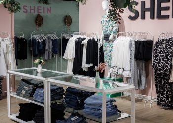 Leopard Denims, Fake Fur Coat, and Black Knee-high Boots Are In