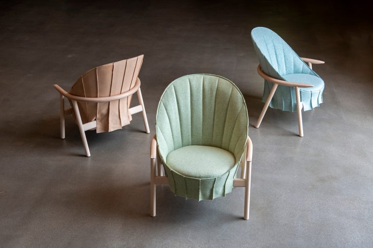 Hidahida chair is draped in Japanese artwork + Scandinavian