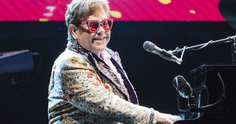 Elton John offers unhappy replace about his eye well being; Empire State Constructing glows inexperienced and gold for Kylie Minogue; Jack Black hosts SNL for fourth time
