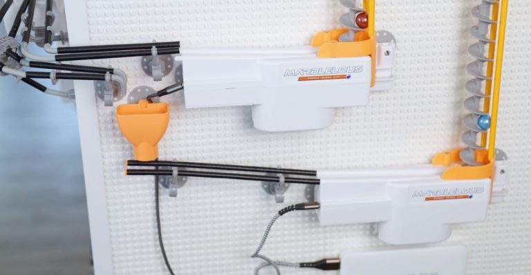 Channel Rube Goldberg with marble operating that may set off your good dwelling