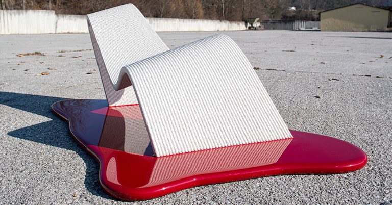 Philipp Aduat combines 3D printed concrete and purple resin for diving chair