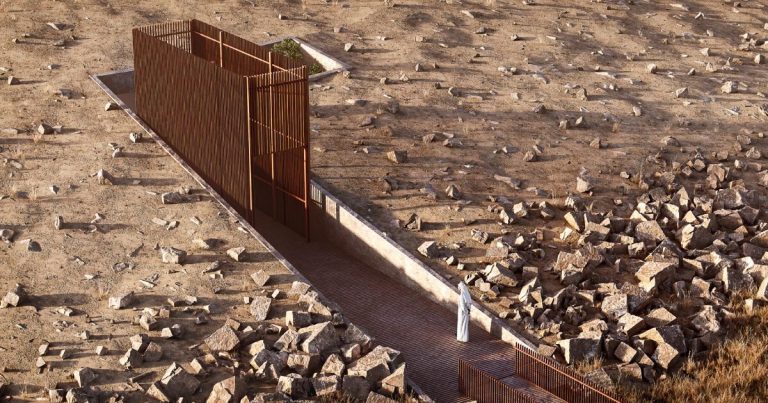 Pragma. Rock artwork guests concentrate on tough terrain within the United Arab Emirates