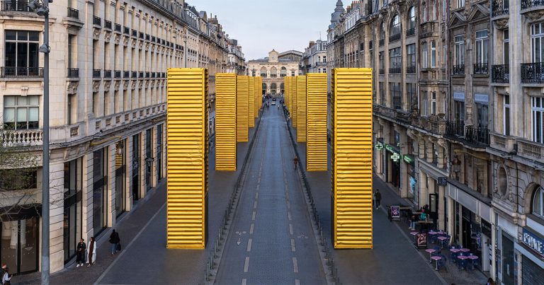 Spy reimagates industrial containers as gold monoliths in Lille’s city panorama