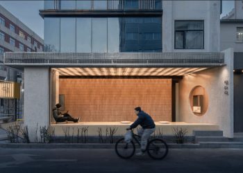 The lanterns comparable lighting shines by the metallic community suspended within the Beijing tea pavilion