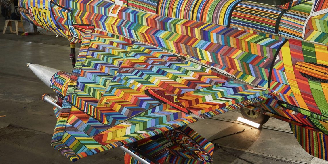 5 years changing into, a MIG-21 battle jet receives a glow from tens of thousands and thousands of glass-color beads