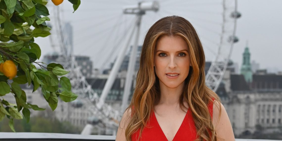 Anna Kendrick makes a mode assertion in a purple Rixo two-piece