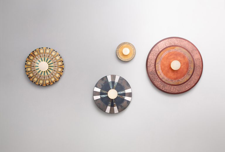 Caleid lamps merger mild and metallic in geometric patterns