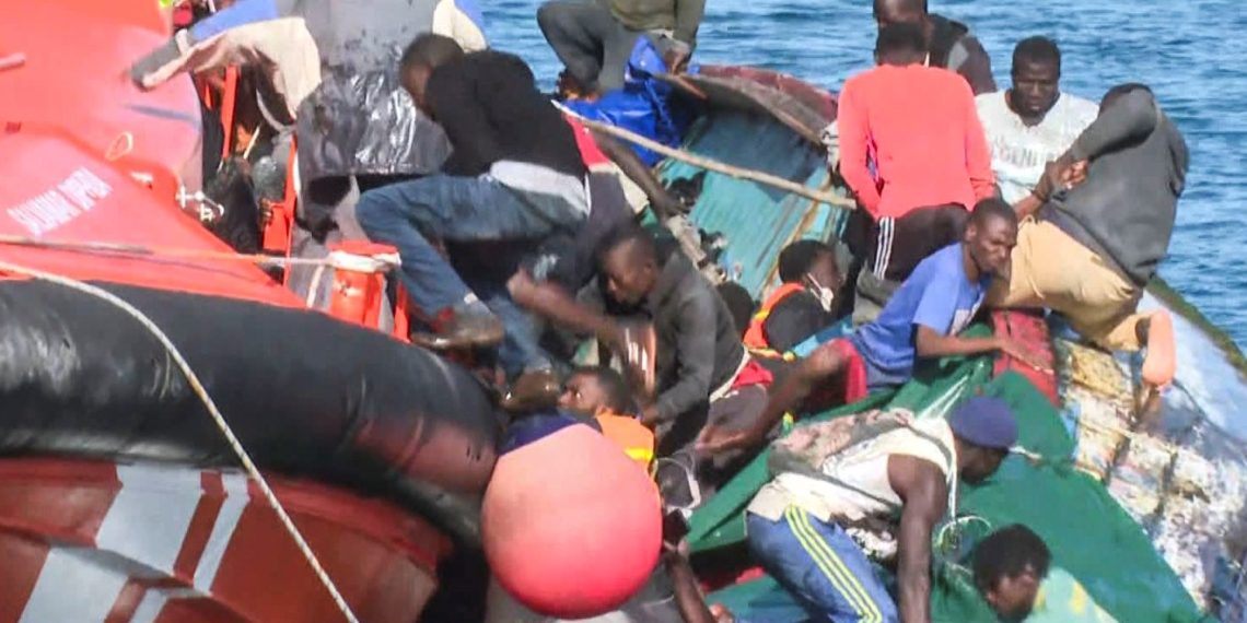 The photographs of the load barge with unlawful immigrants who tipped over and left seven lifeless after they tried to save lots of them