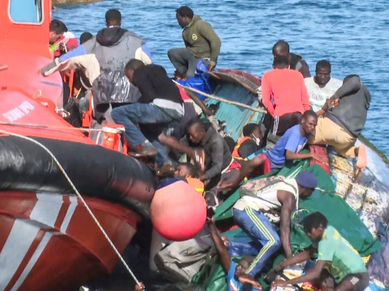 The photographs of the load barge with unlawful immigrants who tipped over and left seven lifeless after they tried to save lots of them