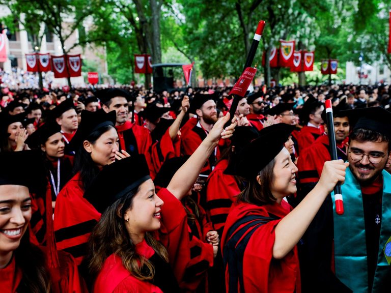 An atypical commencement social gathering at Harvard College, beneath Donald Trump’s missiles