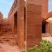 Studio Sangath makes use of brick and terracotta to mannequin the artists’ refuge