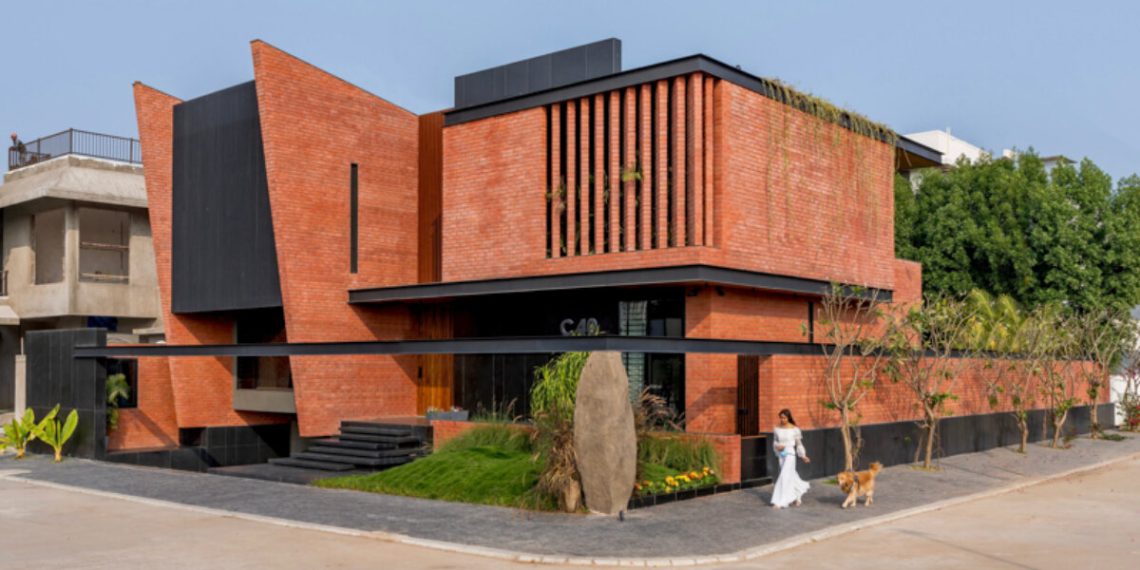 Purple brick and black basalt wrap Abhishek’s home ajmera in India