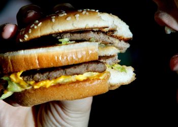 Wage stagnation forces fast-food staff into ‘unsustainable’ financial lure