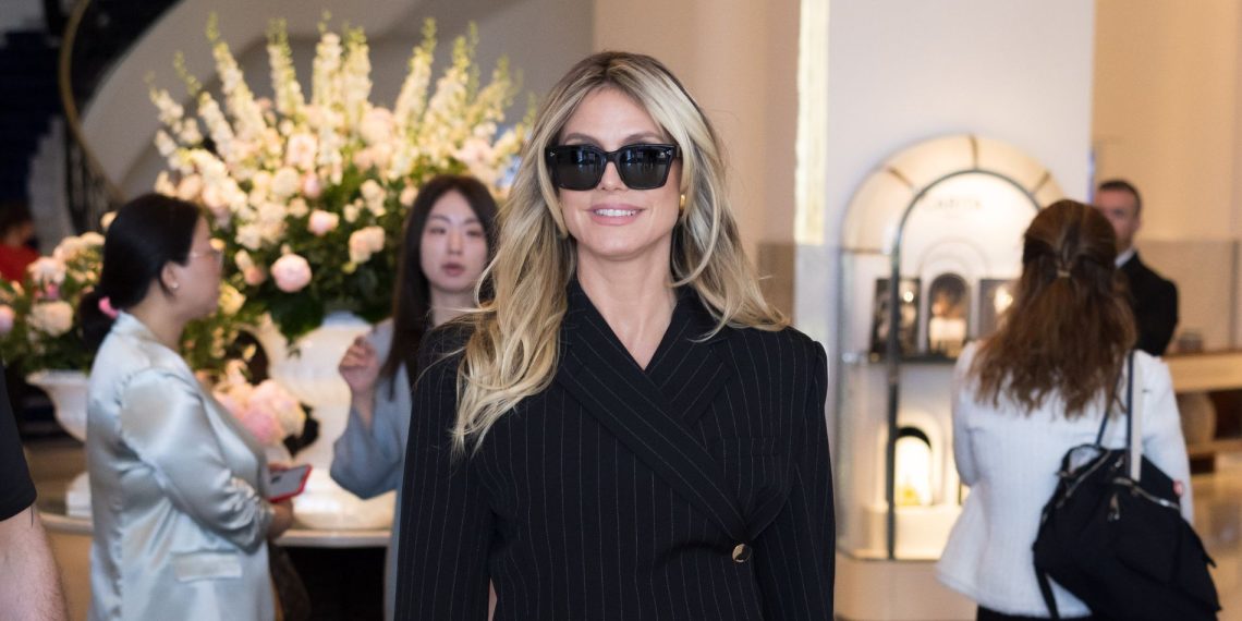 Heidi Klum simply wore a pinstriped tailor-made go well with at Cannes