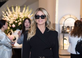 Heidi Klum simply wore a pinstriped tailor-made go well with at Cannes