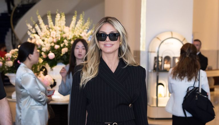 Heidi Klum simply wore a pinstriped tailor-made go well with at Cannes