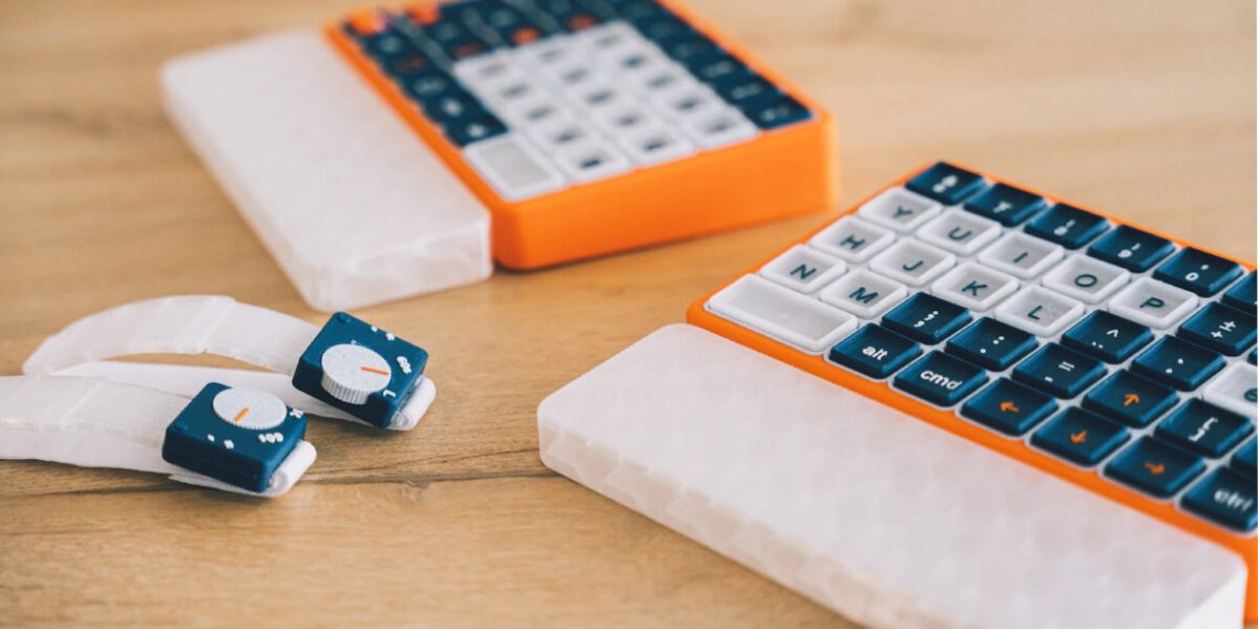 ONCUE is a modular keyboard and sporting cuffs for customers with Parkinson’s