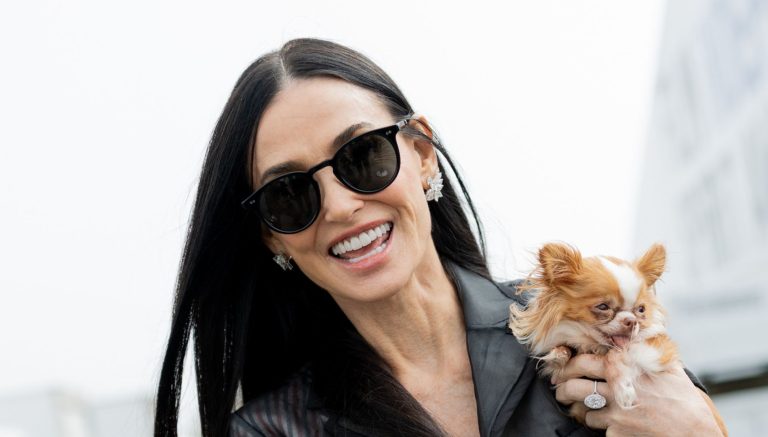 Demi Moore kinds straight-leg denims paired with Birkenstock Bostons