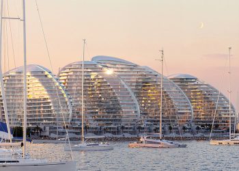 Zaha Hadid Architects carve the towers on the seafront for Marjan Island within the United Arab Emirates