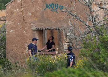 Portuguese firefighters pump water from a effectively
